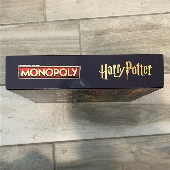 Hasbro Harry Potter Monopoly with Red and Gold Accents - Picture 7 of 8